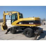 Эскаватор колесный Caterpillar M318D фото