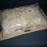 Упаковка для подушек и облегченных одеял фотография