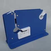 Клипсатор для заклейки горловины пакета фото