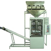 Автомат для фасовки сыпучих не пылящих продуктов с четырьмя весовыми дозаторами УФС-30А-4В и отводящим ленточным транспортером