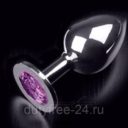 Большая серебристая анальная пробка с круглым кончиком и ярким фиолетовым кристаллом - 9 см. фото