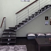 Лестница с забежными ступенями на монокосоуре фото