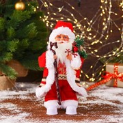 Дед Мороз “В костюмчике с орнаментом, с посохом и подарками“ двигается, 11х30 см фотография