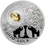 Монеты на счастье. Слоник - серебряная монета с позолоченным слоником во внутренней капсуле (в открытке) фото
