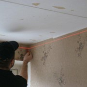 Услуги по монтажу натяжного потолка фото