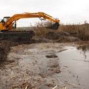 Создание искуственных водоемов плавающим экскаватором-амфибией.