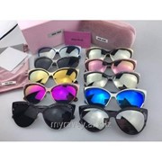 Солнцезащитные очки Miu Miu 182NS фото