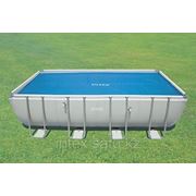 Обогревающее покрывало Intex Solar Pool Cover для бассейнов (549см x 274см) фото