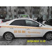 Реклама на крыше такси в астане фотография