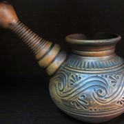 Глиняная турка с декором фотография