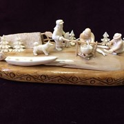 Скульптурная композиция “На рыбалке“, зуб кашалота, бивень мамонта фотография