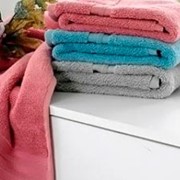 Изделия текстильные. Махровые халаты, полотенца, салфетки, простыни. Оптовая продажа. фотография