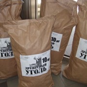 Balení v pytlích uhlí фото