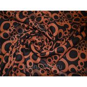 Пальтовая ткань черная с оранжевыми кругами фотография