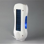 Зарядное устройство с фонариком и FM-радио от солнца фото