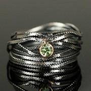 Серебряное кольцо “Гремучие Змеи“ с Демантоидом от WickerRing фотография