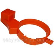 Пластиковый оранжевый регулятор фотография
