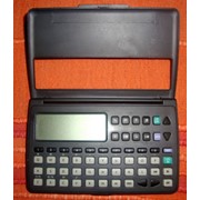 Калькуляторы, электронные записные книжки фото