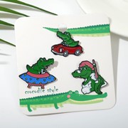 Набор значков (3шт) 'Крокодилы', цветные в чёрном металле фото
