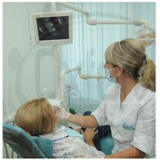 Стоматологические услуги в Киеве, цена фотография
