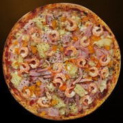 Пицца с морепродуктами. фото