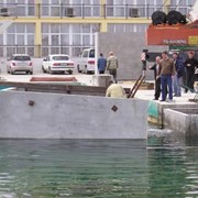 Строительство причала из пустотелых массивов фото