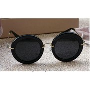 Солнцезащитные очки Miu Miu 13NS фото
