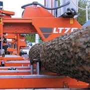Распиловка древесины, лесоматериалов фото
