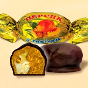 Конфеты шоколадные персик с греческим орехом в шоколаде фото