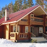Дом из оцилиндрованного бревна и профилированного бруса фото