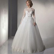 Шикарное свадебное платье с длинным рукавом. фото