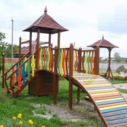 Детские площадки. Многофункциональная деревянная детская площадка. фото