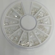 Металлические украшения в карусельке (серебро) фотография