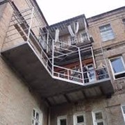 Строительство не стандартных балконов, утепление и остекление фотография