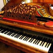Настройка пианино и роялей фото