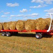 Прицеп Metal-Fach T009 грузовой ёмкостью 11,4 т. Сельскохозяйственная платформа для транспортировки рулонов.