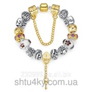 Женский браслет Pandora с золотыми бусинами и подвеской-ключиком фотография