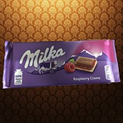 Шоколад Милка Малина крем 100гр фото