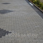 Катушка. Плитка тротуарная вибропрессованная различных форм. фотография