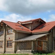 Деревянный дом из оцилиндрованного бревна фото