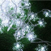 Новогодняя гирлянда снежинки 10 метров белый 100 Leds фото