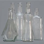 Бутылки стеклянные водочные фотография