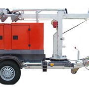 Передвижная дизель-генераторная установка в кожухе с осветительной мачтой фотография