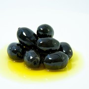 Оливки черные ск фотография