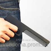 Расческа - пистолет фотография