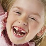 Удаление зубов детям фото