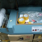 Аппарат для упаковки коробок и товаров пленкой