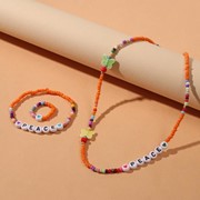 Набор 3 предмета колье, браслет, кольцо 'Бисер' бабочки и надпись, цвет оранжевый