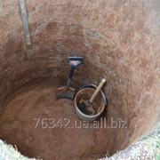 Монтаж сливной ямы, канализационного колодца фото