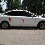 Аренда (прокат) Форд Мондэо (белоснежного цвета) с водителем в г. Днепродзержинске на свадьбу, торжество, и т.д. фото
